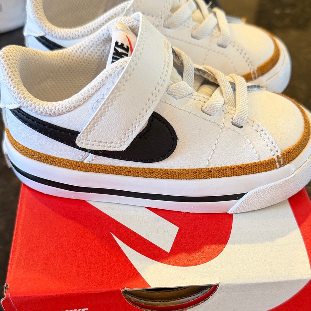 Nike toddler White Sneakers with Black Swoosh and Tan Trim